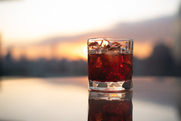 red cocktail sunset