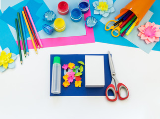 Children's creativity. Materials for crafts from paper. Penguin box