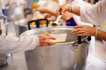 Concept of Feeding : Helping People With Hunger With Kindness