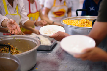 Participation in sharing food for the poor : the concept of food shortage in the world.