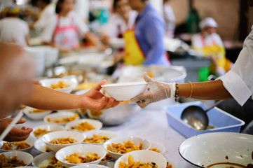 The Hand of the Beggars receives charity food from fellow human beings : the concept of the beggar problem on earth.