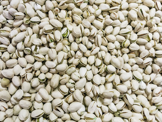 pistachios on black background