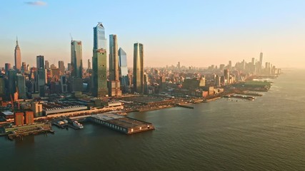 Aerial drone footage of New York skyline with camera rotation in front of midtown Manhattan skyscrapers