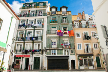 Obraz premium Old building facade is covered with azulejos , Lisbon, Portugal