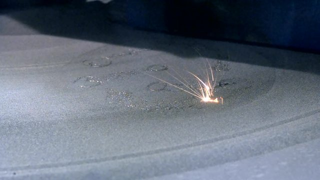 3D printer working close up. Automatic three dimensional 3d printer for metal. Modern 3D printer printing an object from the metal powder. Concept progressive additive technology for 3d printing.