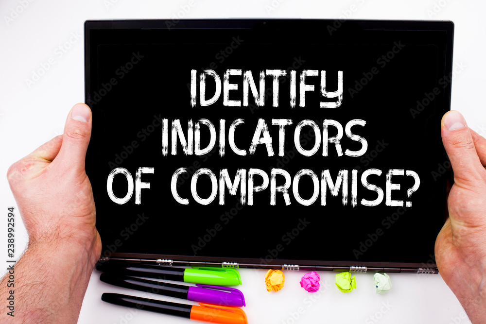 Aufkleber handwriting text writing identify indicators of compromise. concept meaning detect malware online at