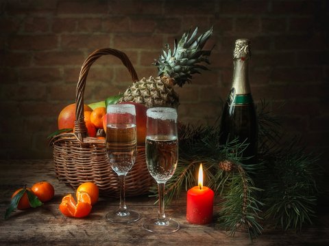 New year still life with fruits and champagne