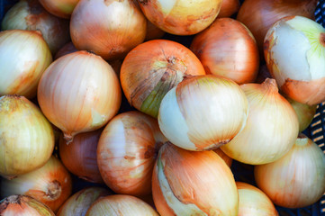 fresh onions texture background / ripe onions for sale in market
