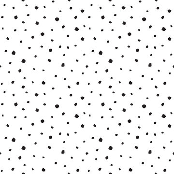 Black uneven specks, spots, blobs, splashes seamless repeat vector pattern. Free hand drawn speckles, flecks, stains or uneven dots of different size texture. Abstract monochrome background.