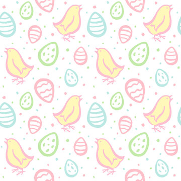 Hand drawn Easter seamless vector pattern. Brush drawn Easter eggs, cute chicks and uneven spots texture. Artistic textured uneven edges. Endless colorful background with chicken and painted eggs. 