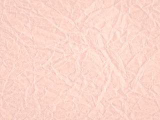 Texture of light red crumpled craft paper. Texture for design, abstract background
