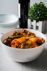 chili pork bones in tomato sauce with carrots and potatoes 