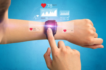 Female hand with smartwatch and health application icons nearby. 