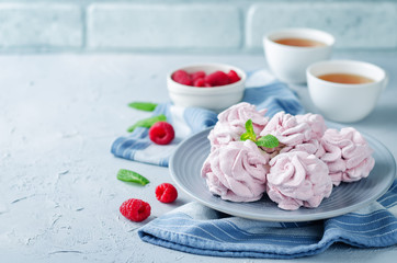 Raspberry Zephyr on a plate with fresh raspberries and mint