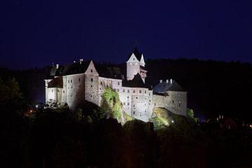Night view on Loket Castle ( Hrad Loket, Burg Elbogen ) impregnable,12th-century Gothic style...