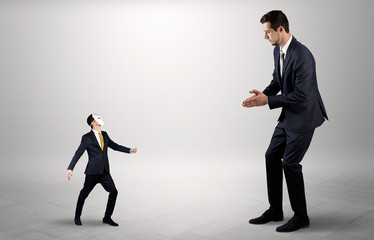 Conflict between small masked businessman and big elegant businessman
