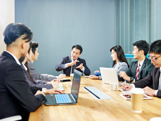 asian corporate business people meeting in office