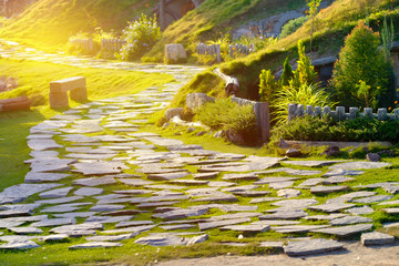 Stone pathway with beautiful sunlight