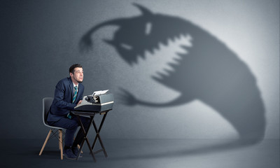 Little hard worker afraid of scary monster shadow
