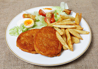 Breaded Chicken steak fries and salad