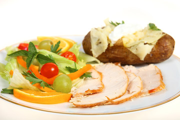 Fototapeta na wymiar Turkey salad and potato dinner