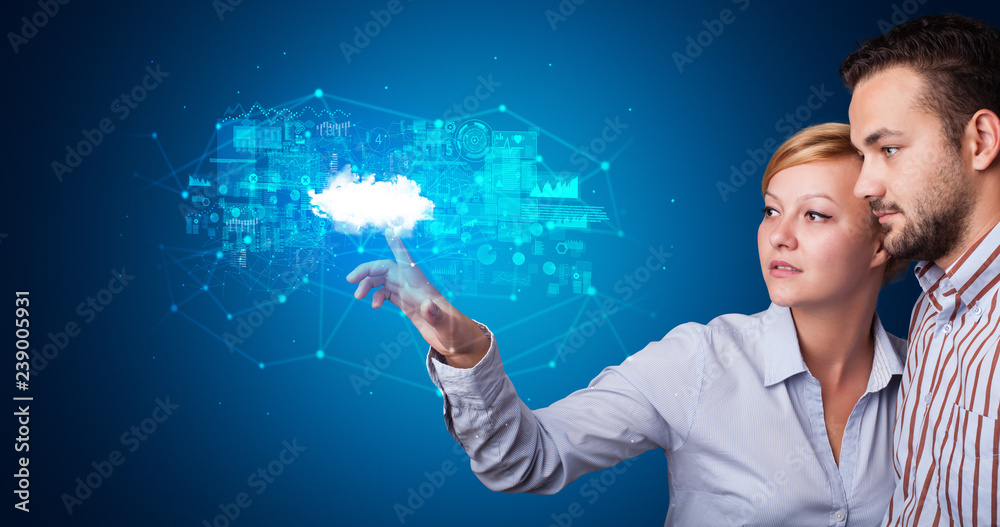Leinwandbilder man and woman touching hologram projection displaying information from cloud based system