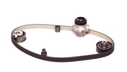 The set of automobile rollers of the gas distribution system of the car, cooling pump and belt,...