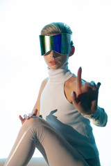 Girl in glasses virtual presses on a virtual button