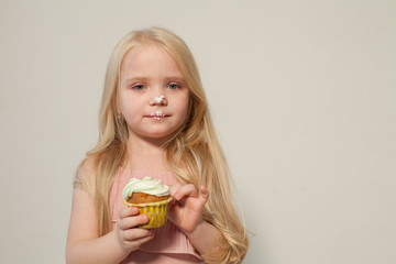 fashion girl eats a candy lollipop cake