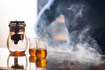 closeup photo glasses with tea are on a table.copy space. bardak. bardac. eastern traditions, customes