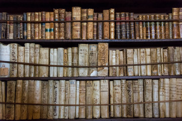 Mallorca, Balearic Islands, Spain - July 21, 2013: Books in the library in the old monastery Valldemossa Charterhouse in the room of Frederic Chopin and George Sand