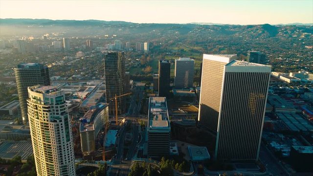 Studio City Los Angeles CA December 2018 sunset 5PM near skyline aerial view with Beverly Hills and the Santa Monica Mountains in background from helicopter drone plane