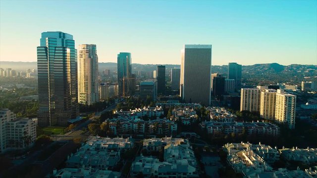 Studio City Los Angeles CA December 2018 sunset 5PM near skyline aerial view with Beverly Hills and the Santa Monica Mountains in background from helicopter drone plane