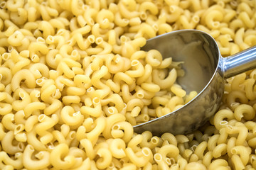  italian pasta with spoon at market, food