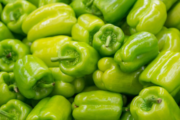 Obraz na płótnie Canvas fresh green bell pepper in market, healthy food