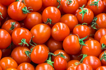 Ripe tomatoes at a farmer's market, healthy food