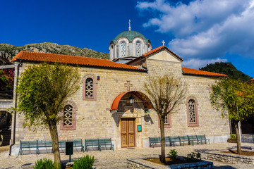 Naklejka premium Church of Saint George in Stemnitsa village, a popular winter destination in mountainous Arcadia in Peloponnese, Greece