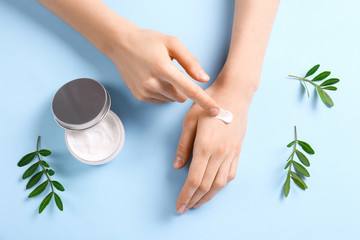 Moisturizing care skincare face cream for healing complicated troubled skin type in an open jar...
