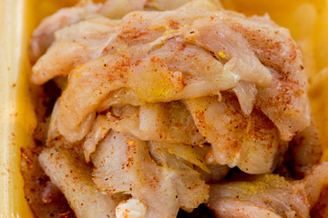 The spiced chicken breast ready to cook
