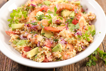 Fototapeta na wymiar gourmet salad with avocado, shrimp and grapefruit