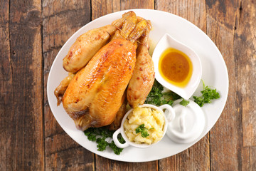 roasted chicken with mashed potato and sauce