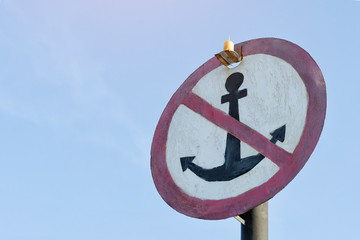 Sign Anchors do not throw against the blue sky. Close-up