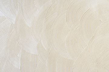 Circular patterns on white plaster. Abstract texture