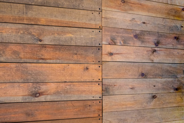 Obraz premium Old brown wooden wall, detailed background photo texture. Wood plank fence close up.