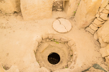 Tarxien, Malta. Prehistoric temple (UNESCO World Heritage List): a hatchway into the underground room, 3250 - 2800 BC