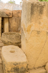 Tarxien, Malta. Stone bowl among the ruins of the Neolithic temple (UNESCO list), 3250 - 2800 BC