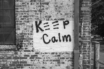 graffiti sign on wall brick keep calm