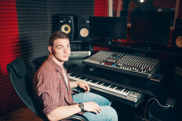 handsome sound producer at workplace. job, profession, music industry people