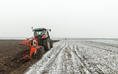 Tractor plowing a field