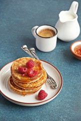 Pancakes with raspberry and honey.